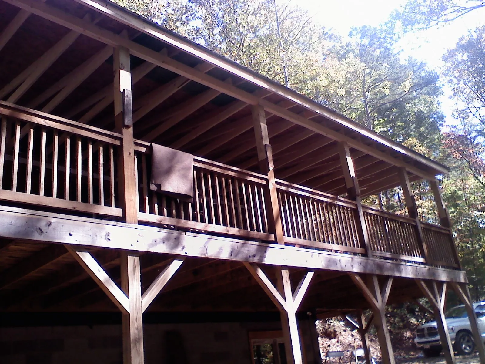 Timber framing under a new elevated porch and deck — Roof Leak Repair in Palm Harbor by Roofing Brothers